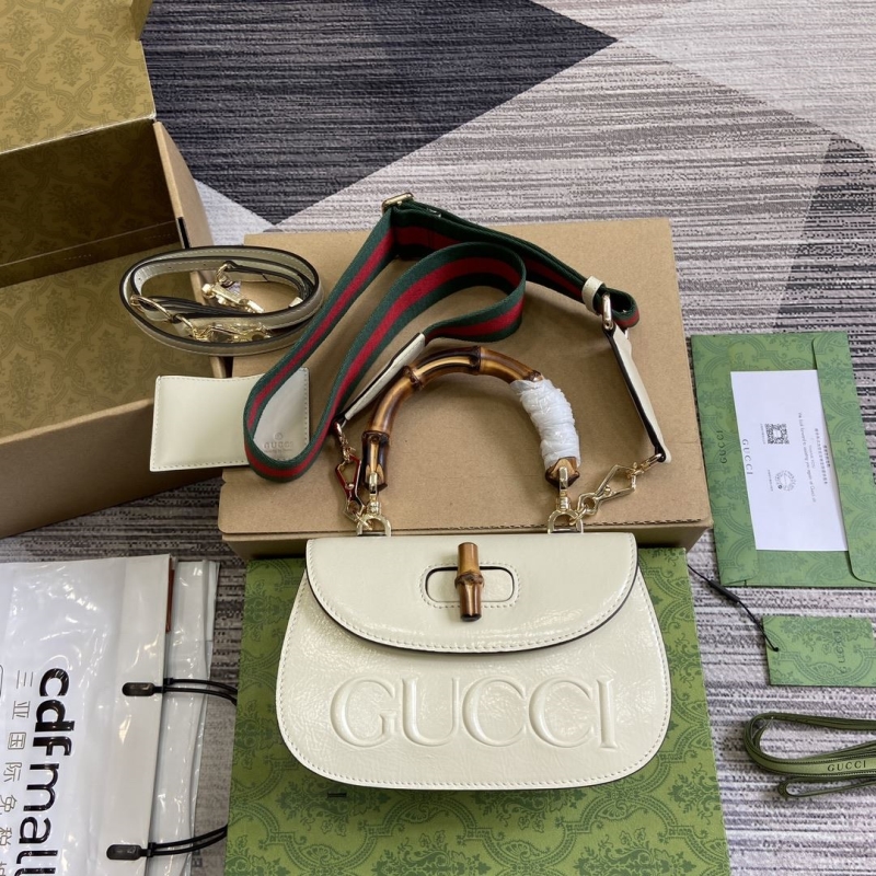 G*u*i top handle bags
